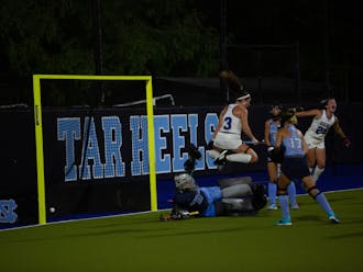 Duke players celebrate a goal during the team's Friday loss to North Carolina.