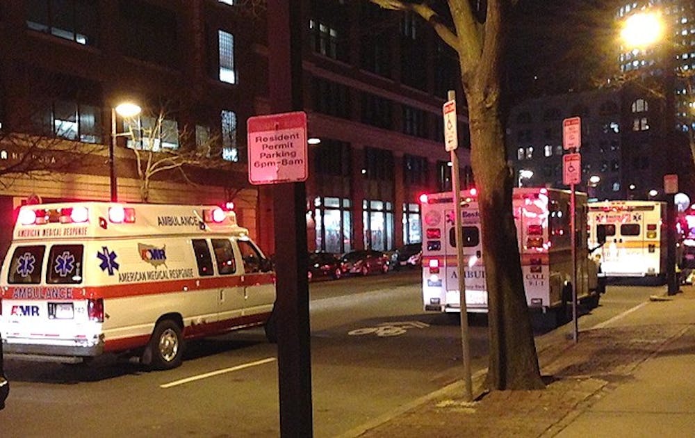 More than 12 ambulances line Columbus Avenue late Monday night, a few blocks away from where the Boston Marathon explosion occurred earlier that day.
