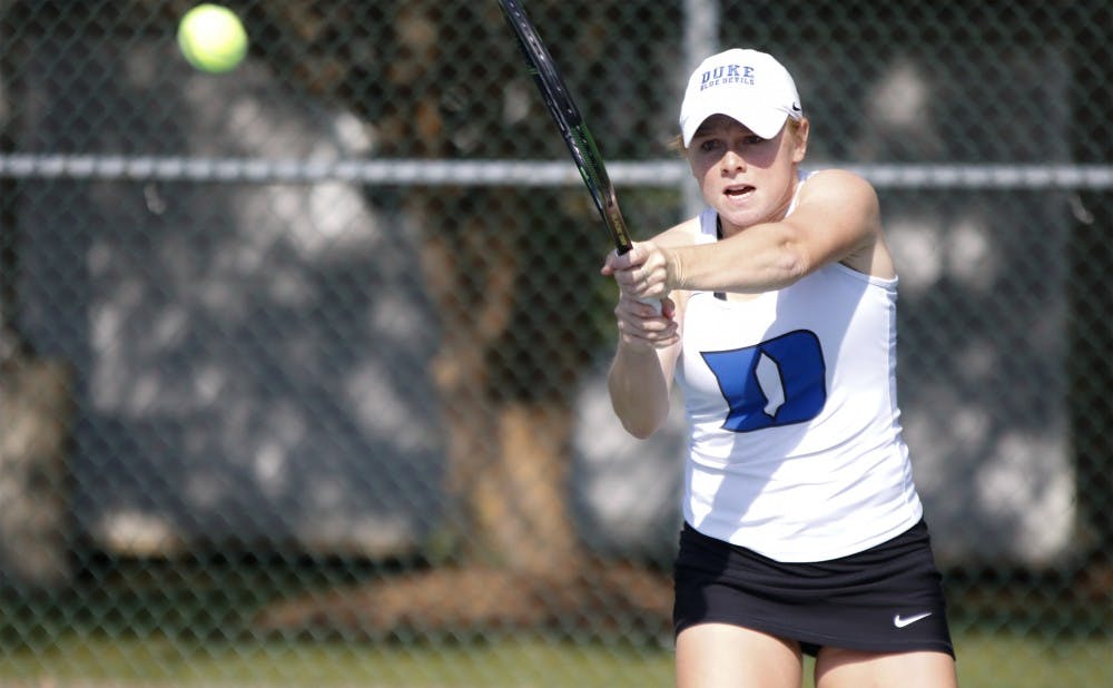 <p>Duke junior Alyssa Smith teamed with classmate Chalena Scholl to knock off their Vanderbilt counterparts in doubles action Friday, but it did not prevent the Commodores from capturing the doubles point.</p>