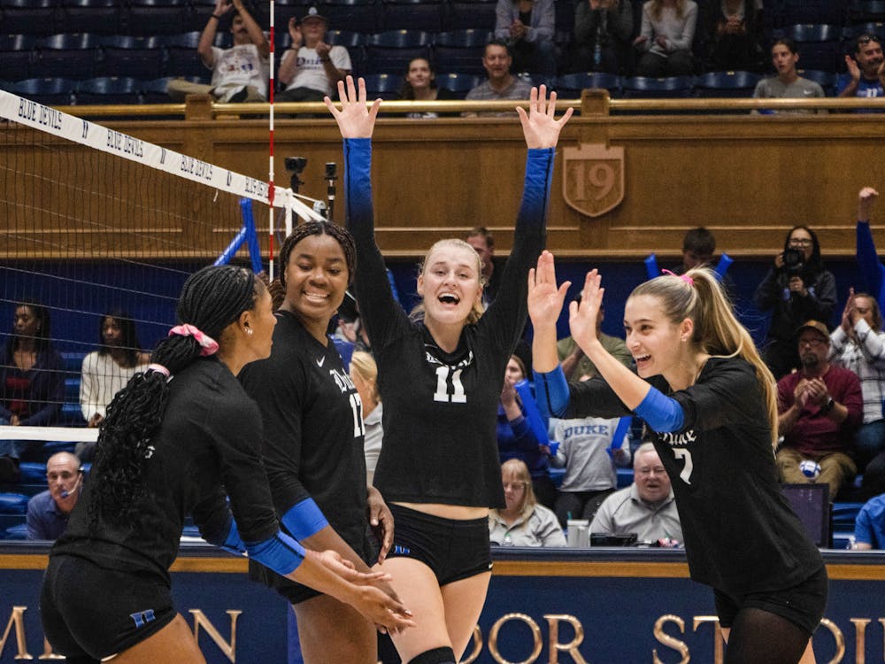 <p>Kerry Keefe and her teammates celebrate Duke's 3-1 victory over Clemson.</p>