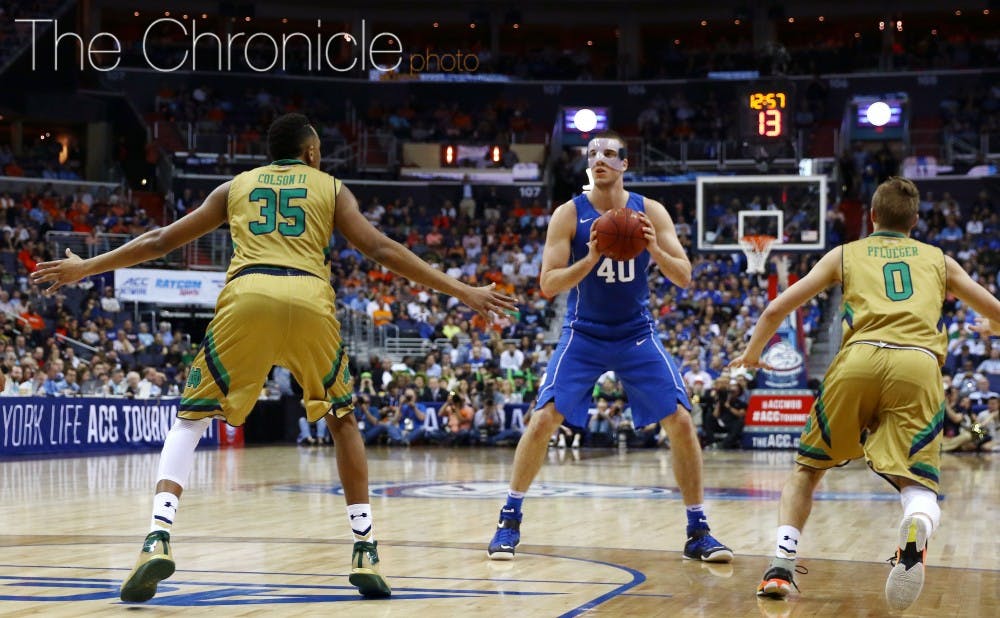 Center Marshall Plumlee broke his nose against N.C. State and donned a protective mask the next day against Notre Dame.