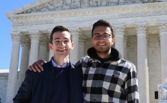 Seniors Luke Farrell, left, and Jake Shulman traveled to D.C. to hear the case.