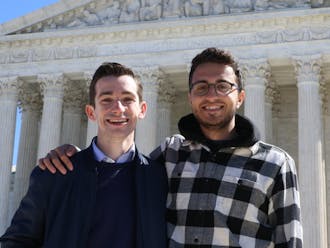 Seniors Luke Farrell, left, and Jake Shulman traveled to D.C. to hear the case.