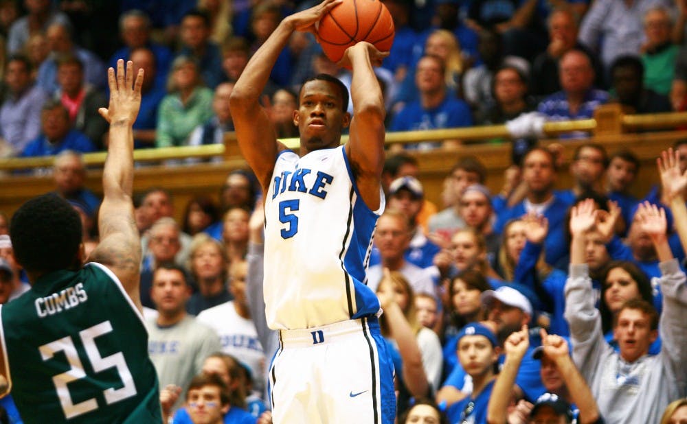 The No. 9 Duke Blue Devils routed the  Eastern Michigan Eagles 82-59 Saturday at Cameron Indoor Stadium. Andre Dawkins and Jabari Parker scored a combined 43 points for the the Blue Devils.