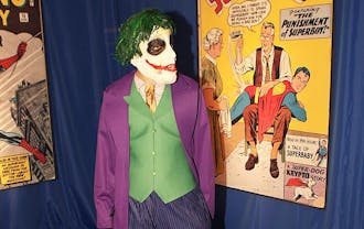 A student dresses up as the Joker from Batman at last year’s Heroes and Villains library party.  Due to Perkins Library renovations, there will not be a library party this year.