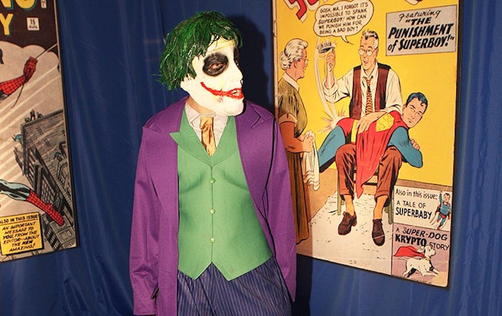 A student dresses up as the Joker from Batman at last year’s Heroes and Villains library party.  Due to Perkins Library renovations, there will not be a library party this year.