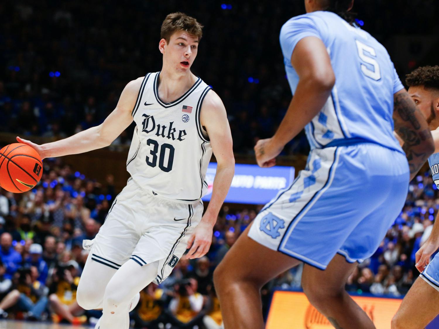 Freshman center Kyle Filipowski controls the ball during Duke's Feb. 4 win against North Carolina at Cameron Indoor Stadium. The ACC Rookie of the Year announced Tuesday he is returning for his sophomore year.