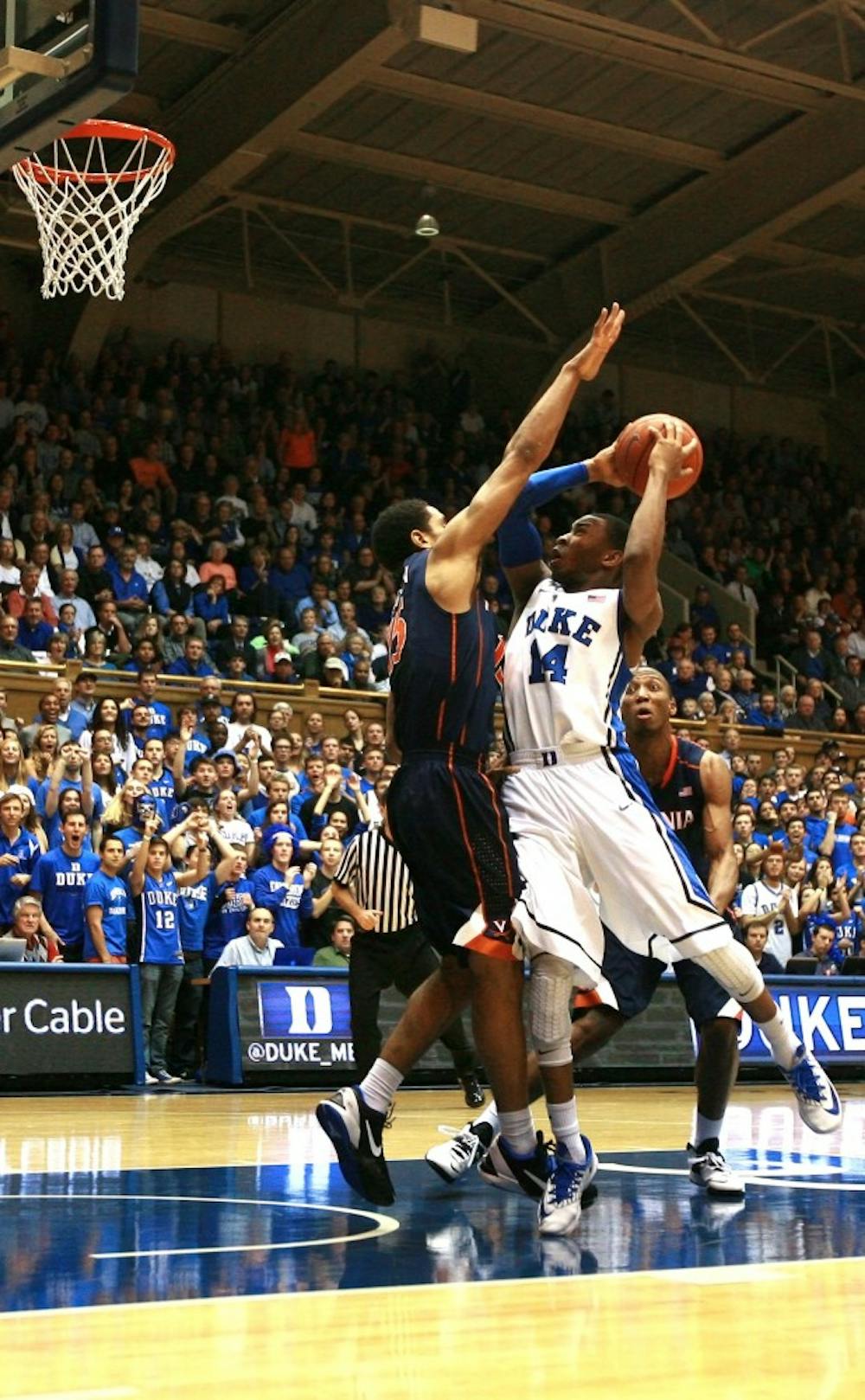 Duke upended Virginia 69-65 at Cameron indoor Stadium to hand the Cavaliers their first loss of conference play. Sulaimon's shot from the left corner with 13.5 seconds to play bounced off the iron and bounded high in the air before finding the bottom of the net to give the Blue Devils their go ahead score.