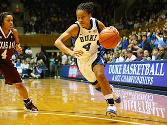 With less than a minute left, Jasmine Thomas hit a jumper to give Duke a lead it would never relinquish.