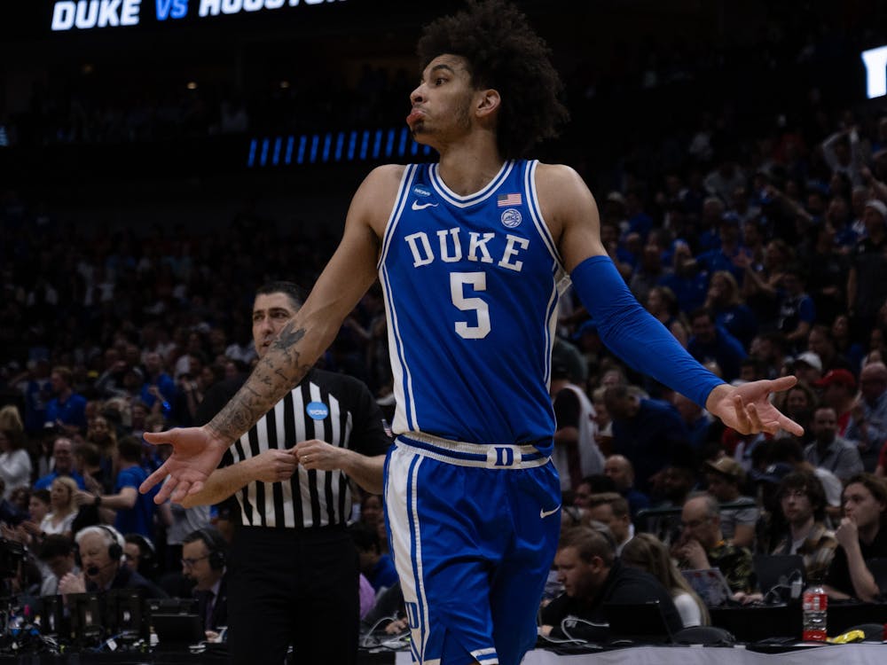 Tyrese Proctor taunts Houston during Duke's Sweet 16 win. 