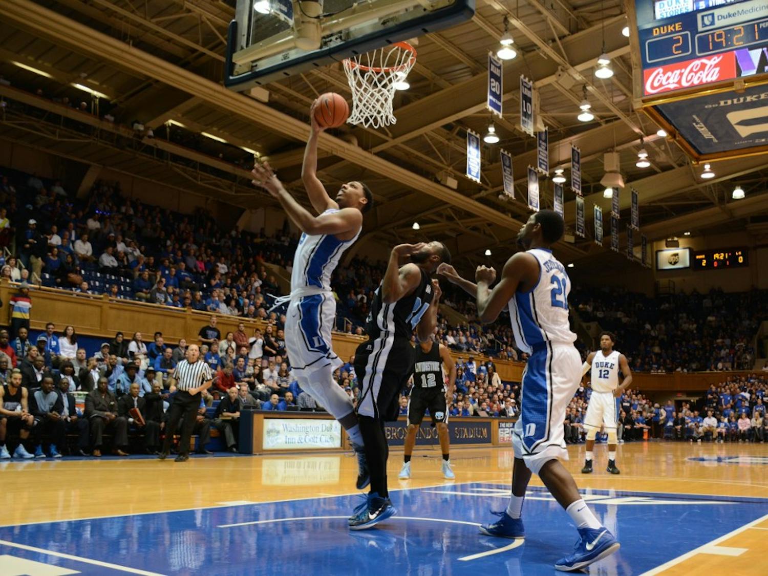 Freshman Jahlil Okafor had 15 points and five rebounds as the Blue Devils steamrolled Livingstone in their first exhibition contest Tuesday night.