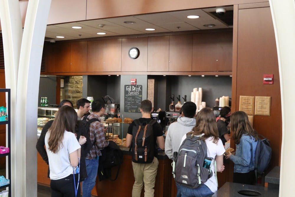 A crowd of students gathers around Saladelia Café in Perkins during the afternoon Monday for a quick break and refuel.