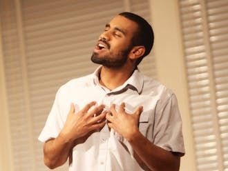 A student performs at the 2013 Me Too Monologues performance, a yearly show featuring anonymously submitted stories about Duke life.