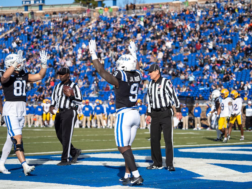 Running back Jaquez Moore celebrates in the end zone in last year's game against Pittsburgh. 