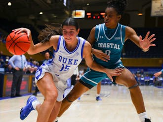 Sophomore guard Emma Koabel challenges her defender during Duke's win against Coastal Carolina.