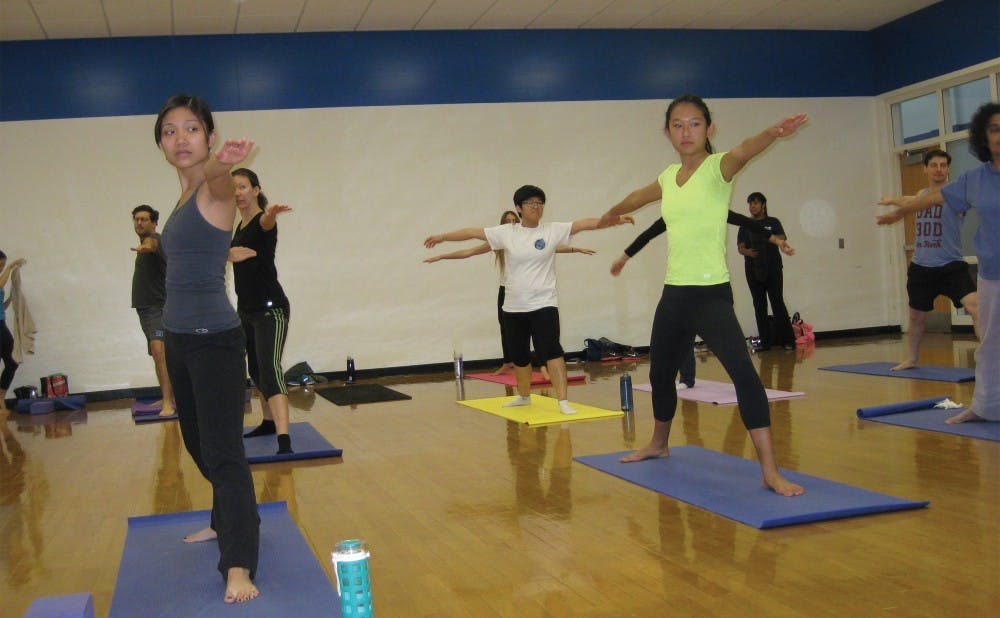 Yoga is a popular pastime for students trying to relax—many dedicated to the practice also teach classes at Wilson and Brodie Recreations Centers.