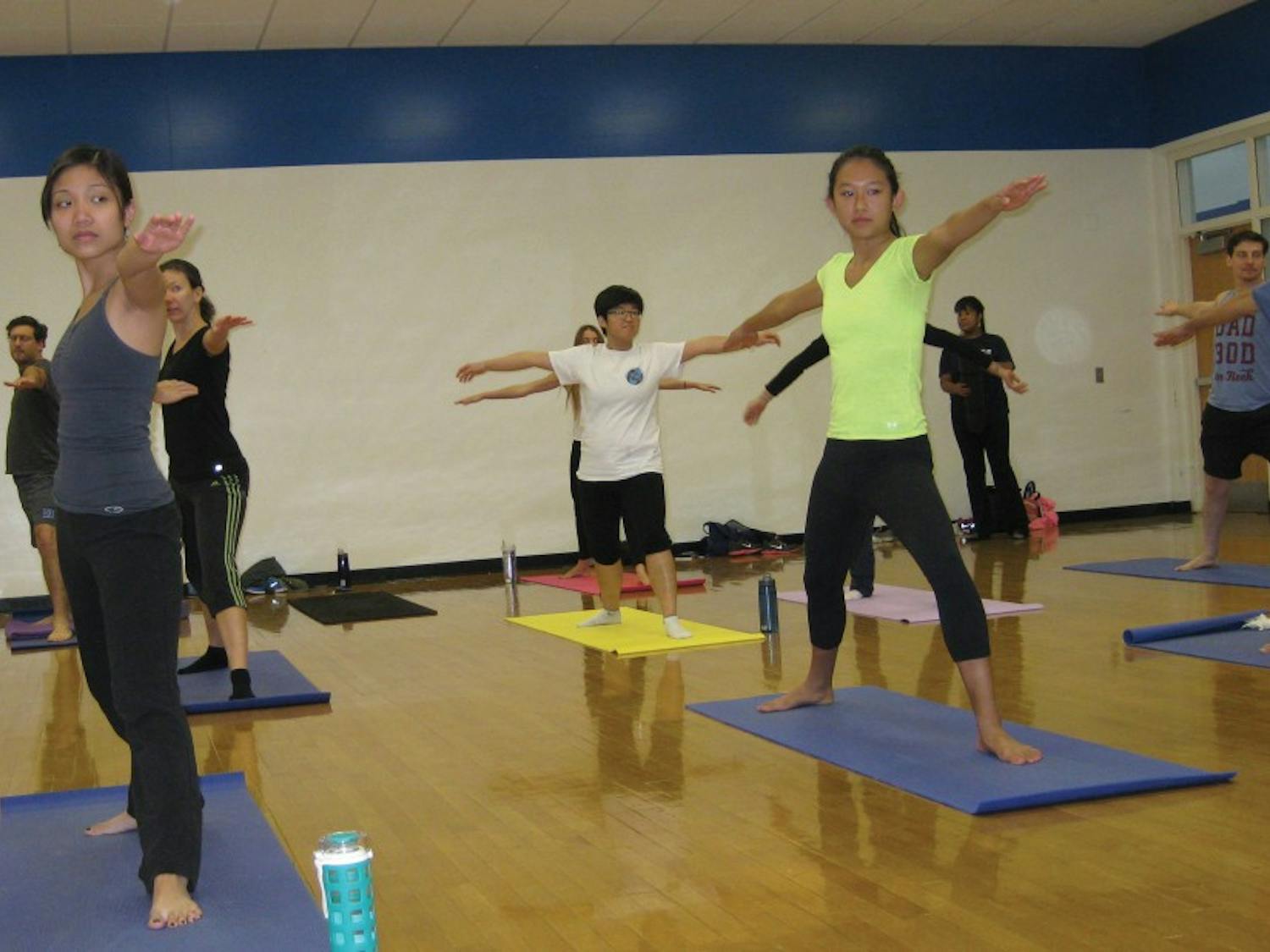 Yoga is a popular pastime for students trying to relax—many dedicated to the practice also teach classes at Wilson and Brodie Recreations Centers.
