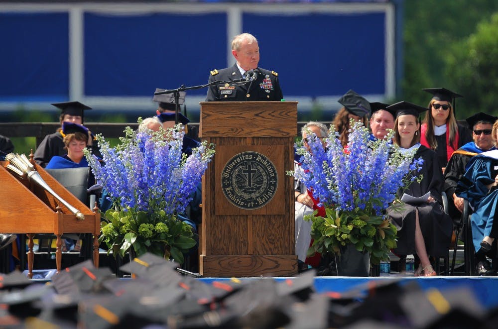 Gen. Martin Dempsey, chairman of the Joint Chiefs of Staff, addresses the class of 2014 during Sunday's commencement ceremony.