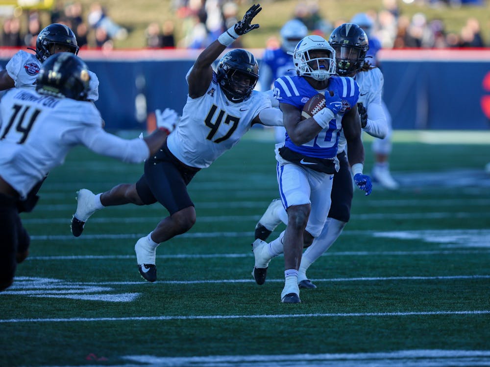 Jaquez Moore's 14-yard rushing touchdown opened the scoring Wednesday, giving Duke the early lead and its program-record-tying 29th score on the ground in a single season.