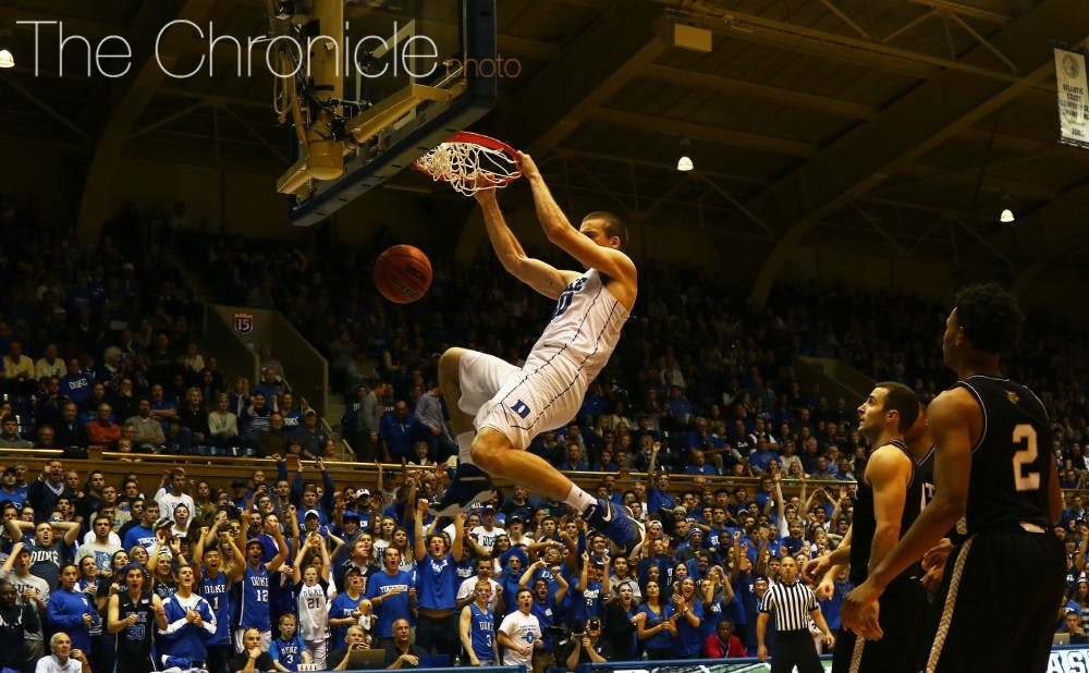 Graduate student Marshall Plumlee converted this dunk and added six free throws, but played a major role in the offense by attracting attention and dishing out to open players on the perimeter.