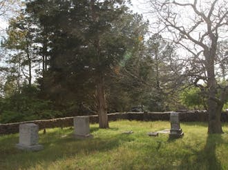 The TJ Rigsbee Family Grave Yard, located in the Blue Zone, serves as a reminder of the family who had owned land that would become West Campus.