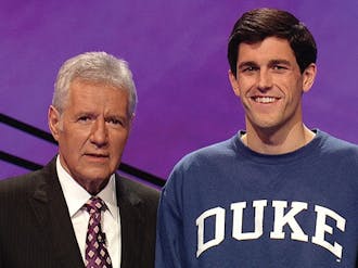 Mackebee, pictured with host Alex Trebek, was one of 15 students selected to participate from a pool of 12,000.