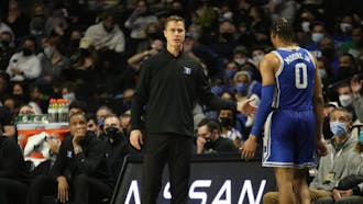 Scheyer's playing career was filled with humps and bumps, but he ended on the mountaintop.