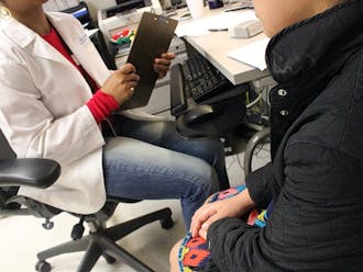A physician reads the state-mandated script to a patient seeking an abortion as part of the Woman’s Right to Know Act. North Carolina abortion providers are currently fighting certain aspects of the act.