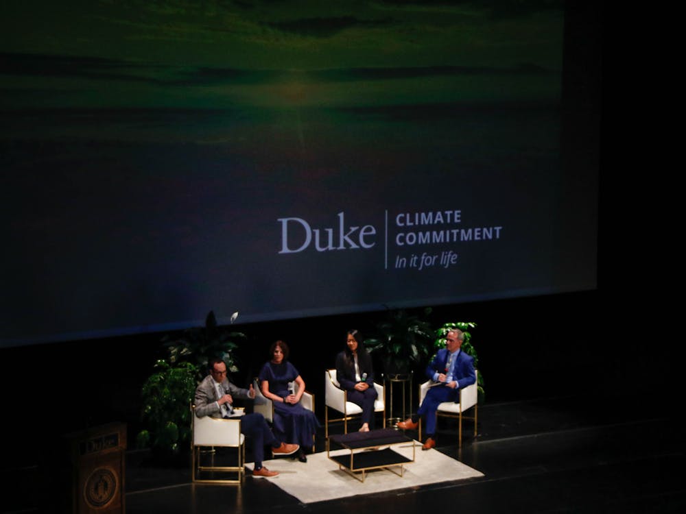 <p>Brian Murray, interim director for the Nicholas Institute for Energy, Environment &amp; Sustainability, moderating a panel at Duke's Climate Commitment announcement on Sept. 29, 2022. Murray was joined by &nbsp;Ben Abram, Pratt ’07, Alison Taylor, Trinity ’84, and Claire Wang, Trinity ’19.</p>