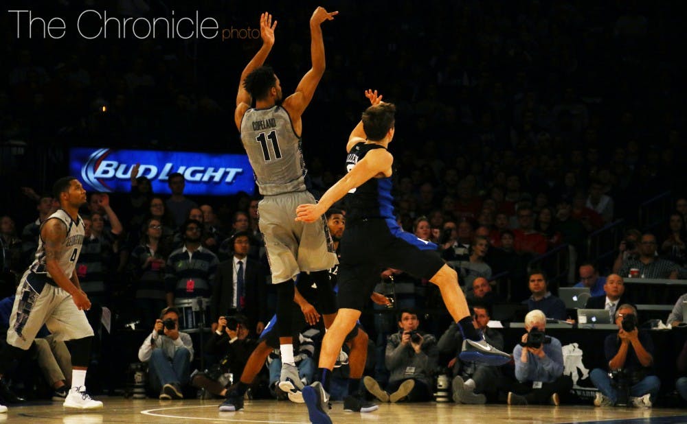 <p>Isaac Copeland's two late 3-pointers kept the Hoyas nipping at Duke's heels, but his would-be game-winner clanged off the front of the rim as time expired.</p>