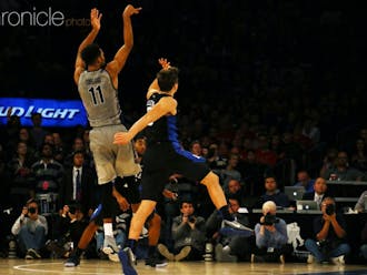 Isaac Copeland's two late 3-pointers kept the Hoyas nipping at Duke's heels, but his would-be game-winner clanged off the front of the rim as time expired.