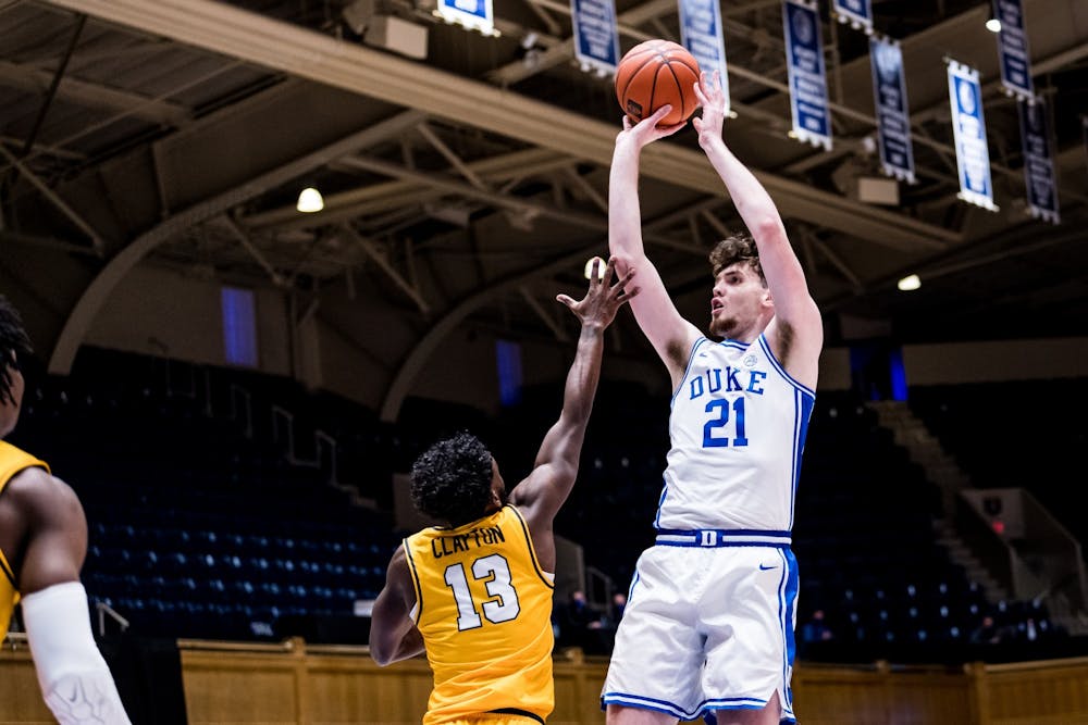 <p>Despite sitting the last six minutes of the half with three fouls, Matthew Hurt helped the Blue Devils with eight first half points.</p>