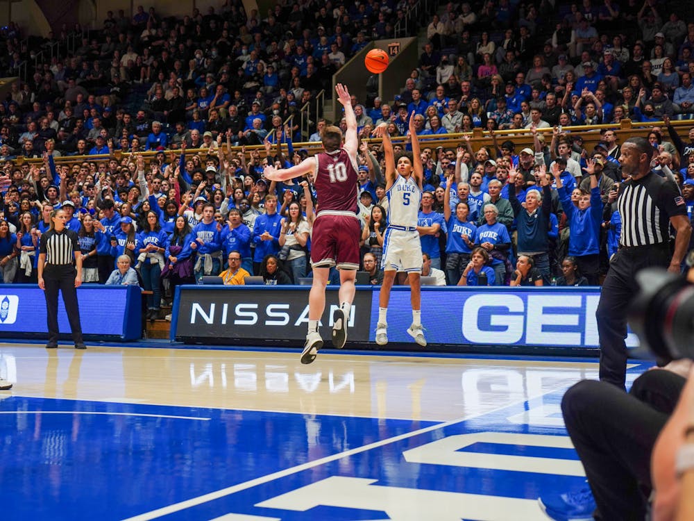 <p>Tyrese Proctor lets loose a 3-pointer during the first half of Duke's 74-57 win against Bellarmine.</p>