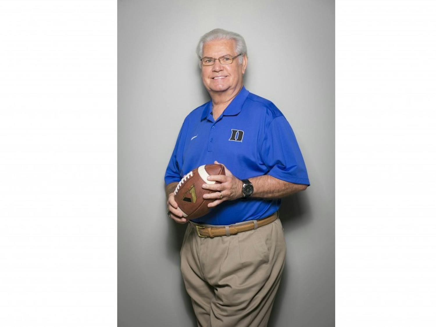 Voice of the Blue Devils, Bob Harris, poses in the studio for a portrait.  Image will be used to highlight his years of service in the final year of doing "play by play" for both the football and basketball programs.