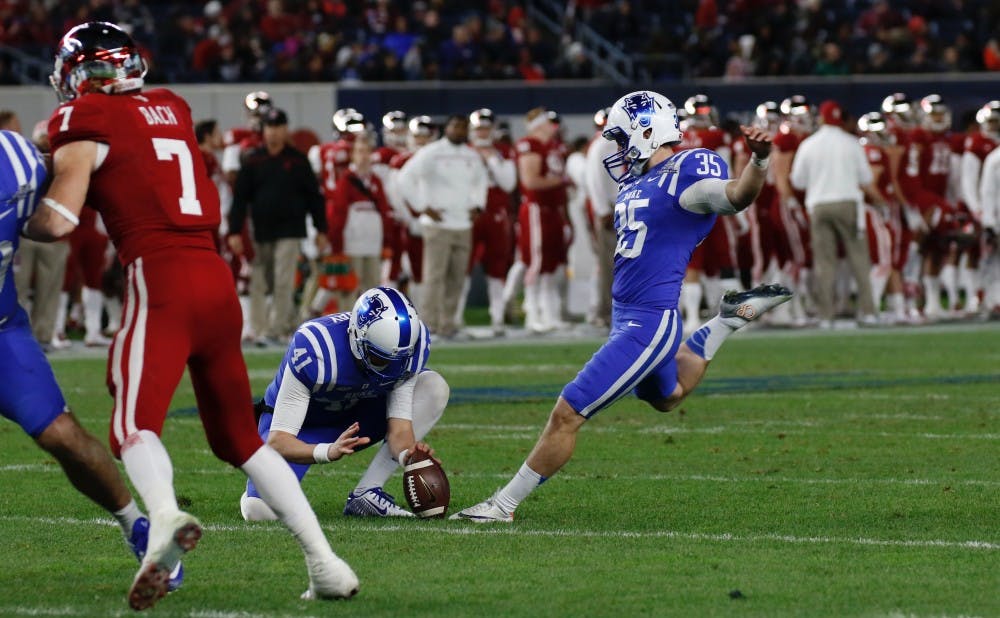 Ross Martin opened the scoring with a 52-yard field goal and ended it with a 36-yarder in overtime.