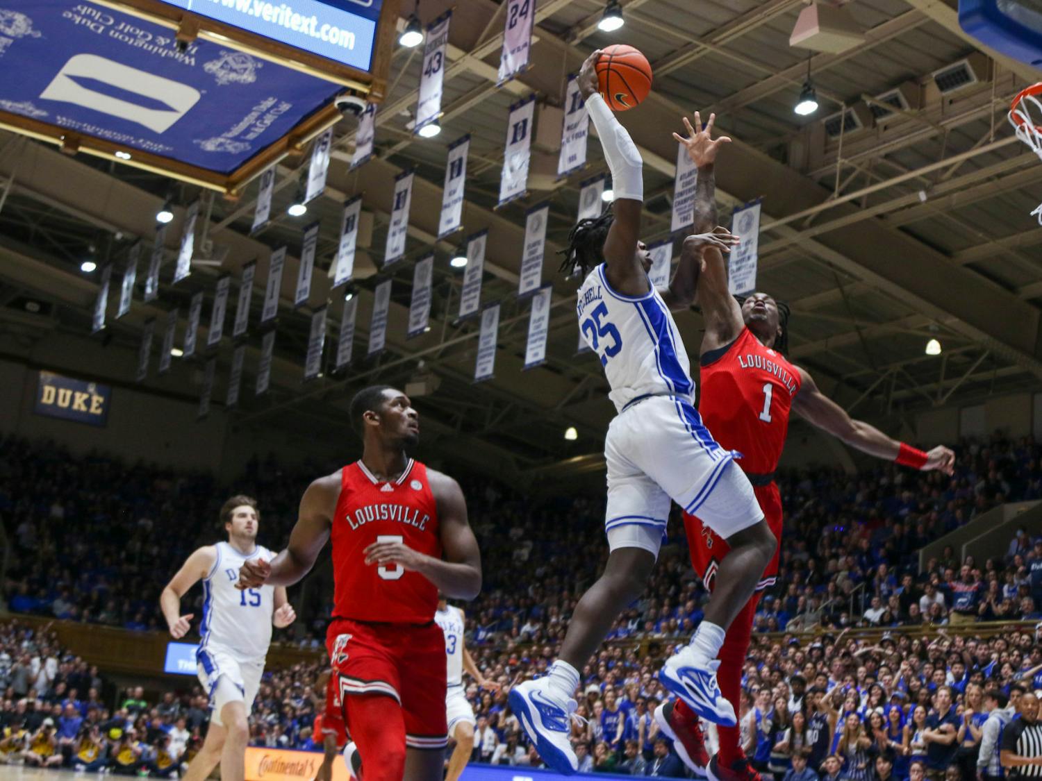 Mark Mitchell skies for the dunk during Duke's Feb. 20 win against Louisville at Cameron Indoor Stadium.