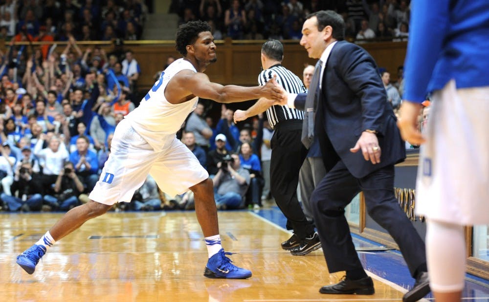Justise Winslow got a high-five from head coach Mike Krzyzewski after a second half 3-pointer helped break the game open.