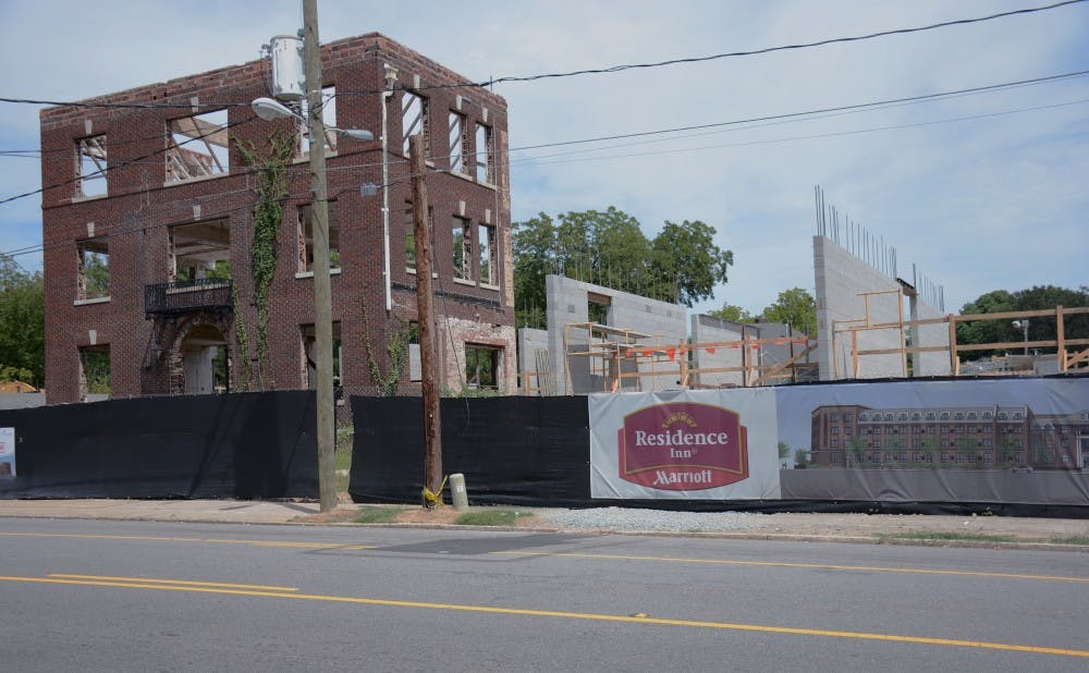 Construction has begun on a Residence Inn by Mariott on the site of the historic McPherson Hospital.