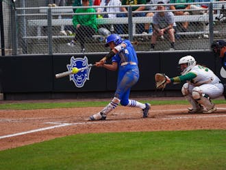 Sophomore Ana Gold swings at bat during Duke's Friday win against George Mason.