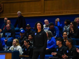 Kara Lawson patrols the sidelines during Duke's home win Thursday evening against Pittsburgh.