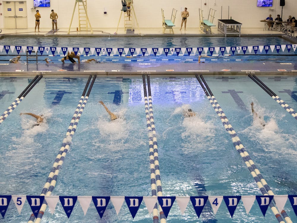 Duke swimming and diving races against Texas. 
