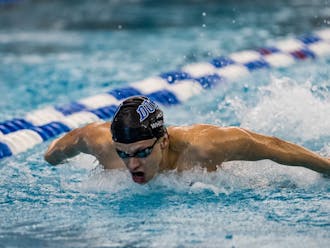 Junior Matthew Whelan posted a career-best 46.91-second time in the 100-yard butterfly Friday. 