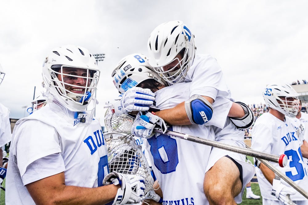 Senior attacker Joe Robertson (8) has been a force for the Blue Devils this season, now with six hat tricks including the quarterfinal matchup against Loyola.