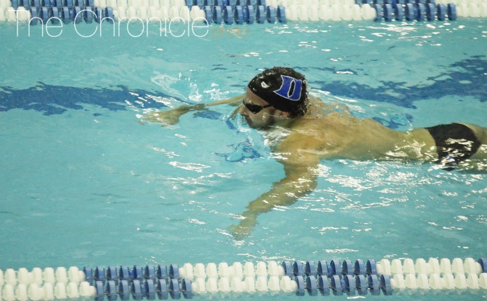 Senior Peter Kropp posted individual wins in both breaststroke events Friday, one of several standout performances for the Blue Devils against stiff competition.&nbsp;