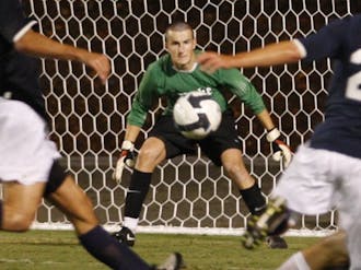 Freshman goalkeeper James Belshaw was forced into action often Tuesday as Elon dominated play, but Duke defeated the Phoenix 2-1 behind his six saves.