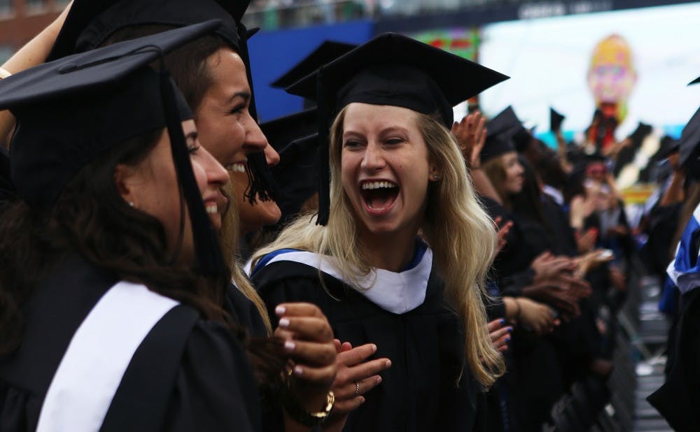Despite threats of inclement weather, commencement 2015 went smoothly at the Durham Bulls Athletic Park Sunday morning.