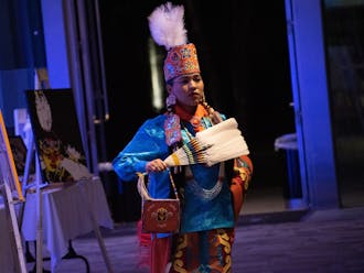 School of Nursing student Natha Little Crow, who is Otoe-Missouria, Osage, and Ioway, walks in the fashion show during the Indigenous Arts Showcase and Gala on Nov. 5.