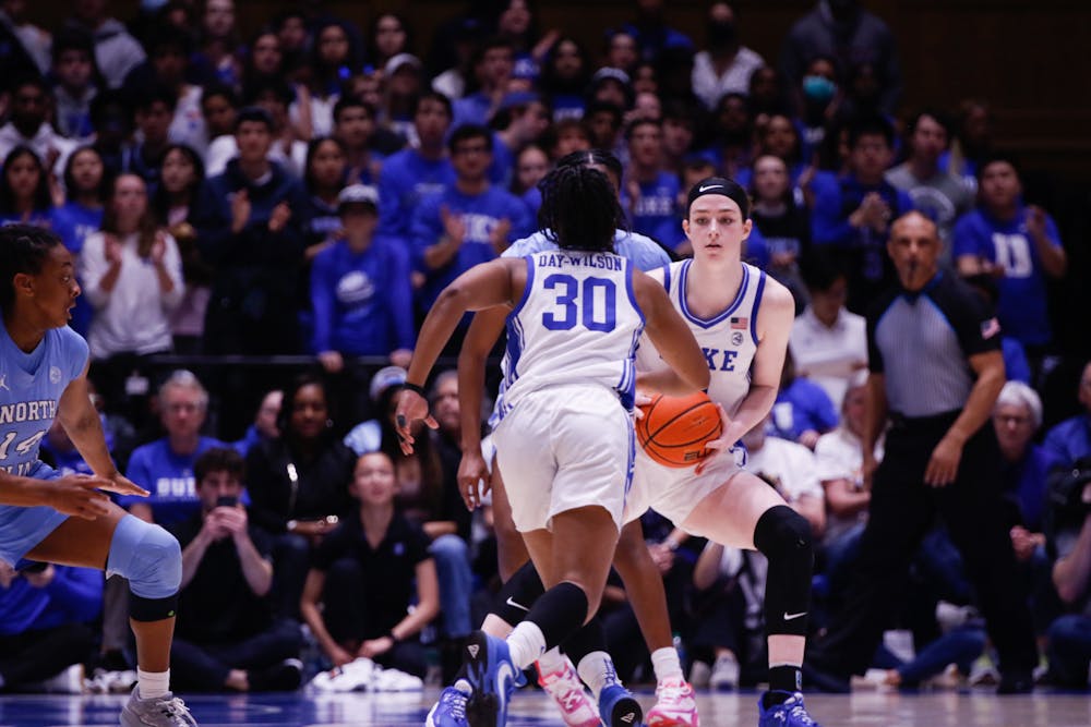 Shayeann Day-Wilson (middle) rushes to take the ball from Kennedy Brown (right) in Duke's loss to North Carolina Feb. 26.