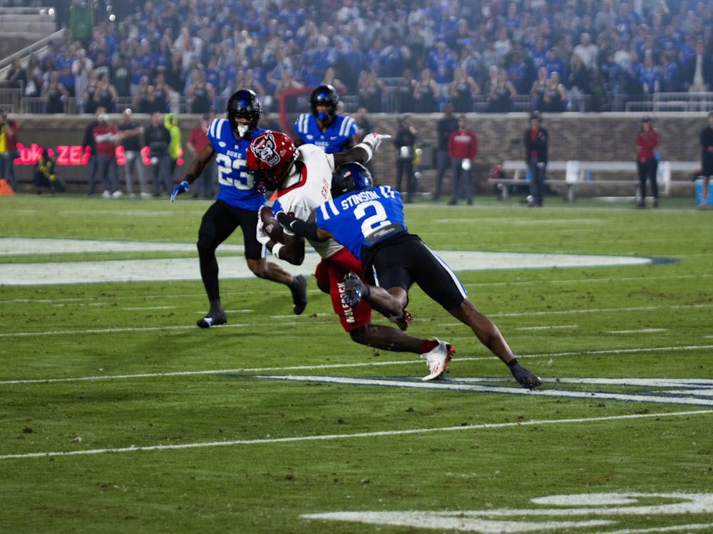 Jaylen Stinson (2) drags down an N.C. State player during Duke's Saturday win.
