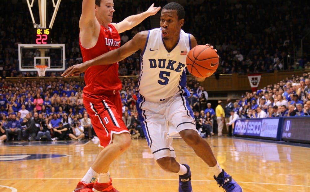 Rodney Hood led Duke with 22 points and added nine rebounds as the Blue Devils cruised to a season-opening win against Davidson.